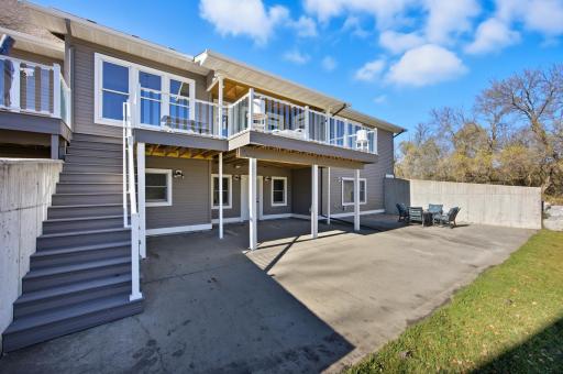 maintenance free deck with plexiglass railing and walk-out patio