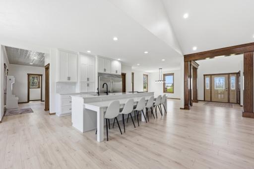 kitchen accesses rear mudroom/pantry/laundry to the left