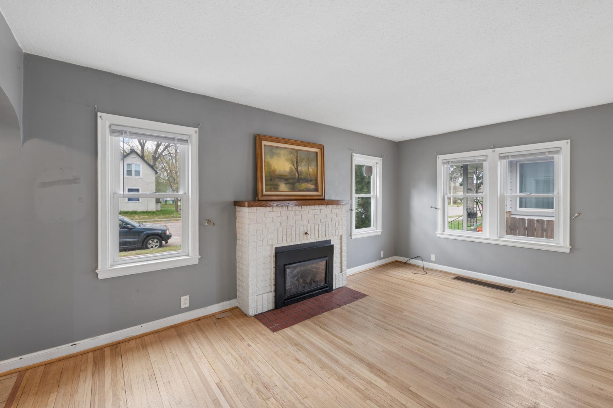 Gas brick fireplace with flush hearth