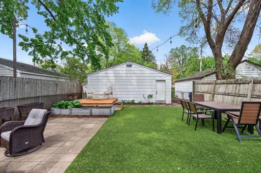The back lawn is low-maintenance, pet-friendly astroturf installed professionally with proper drainage.