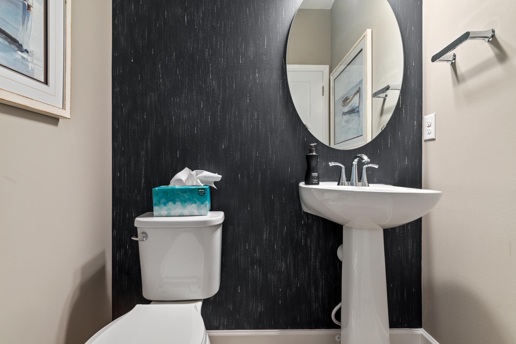 (Photo of decorated model, actual home's finishes will vary) Powder room on the main floor!