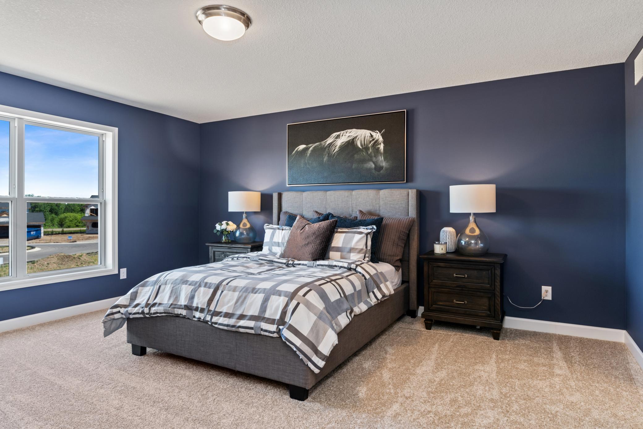 (Photo of decorated model, actual home's finishes will vary) Find your retreat in the stunning owner's suite. Enjoy the exclusivity of a private bath and huge walk-in closet.