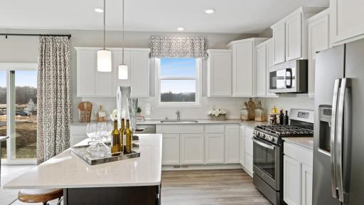 (Photo of decorated model, colors and features will vary) Another view of this spacious kitchen!