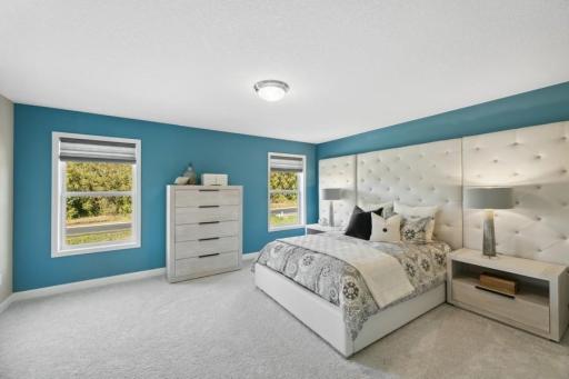 (Photo of decorated model, colors and features will vary) Massive and dreamy owner's suite will accommodate king-sized furniture and club chairs.