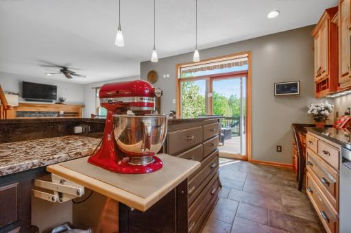 Complete with bakersâ station that includes an appliance lift.