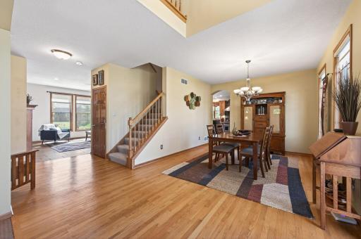 The hardwood floors continue into the large dining room, which connects directly to the kitchen, an ideal setup for entertaining and everyday living alike.