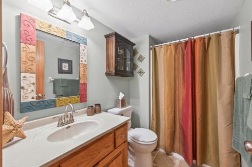 A conveniently located 3/4 bath on the lower level, complete with a heated tile floor, means guests and family never have to travel far.