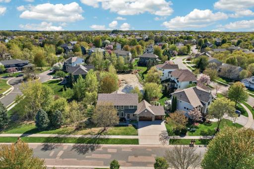This Lundgren-Bros built home from 2001 is known for superior construction and attention to detail, and it shows. Newer roof, siding, a quality concrete driveway, and stamped sidewalk complete the exterior, plus a three-car heated garage.
