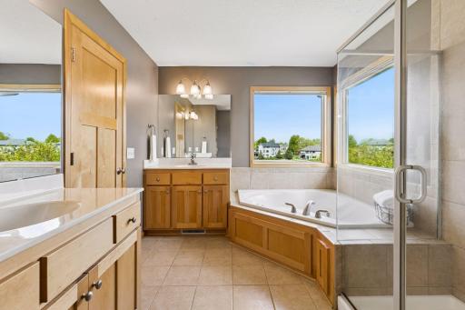 Primary bath with whirlpool tub and separate shower