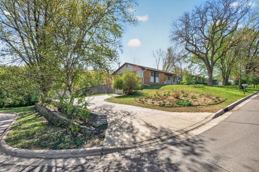 Your new home has a large two-car tuckunder garage with stamped concrete driveway and extra parking