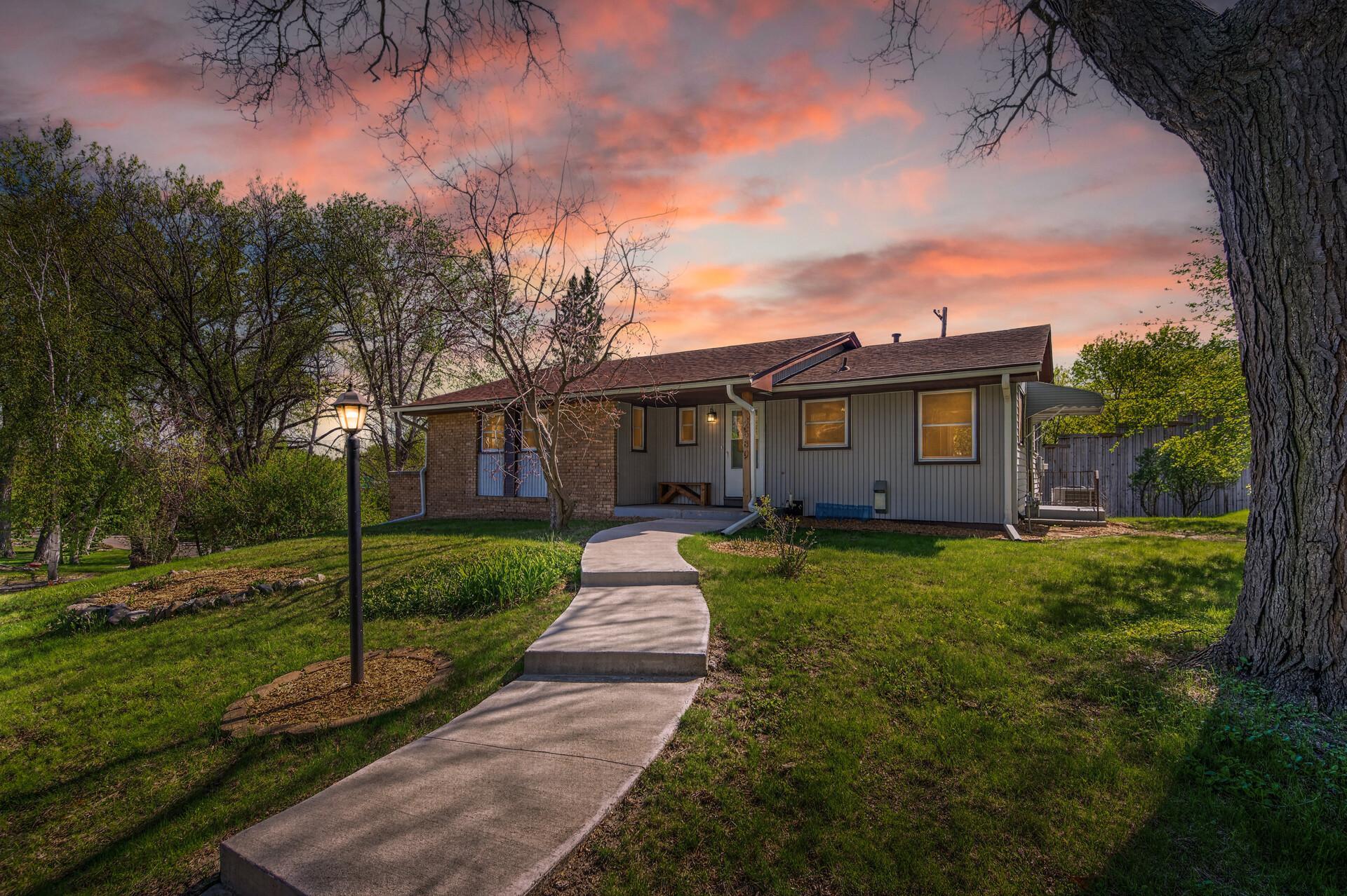 A twilight view of the front of your new home