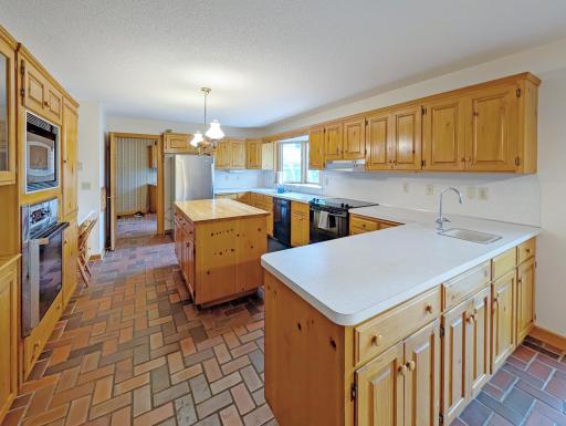 Quarry tile floor in the country style kitchen.