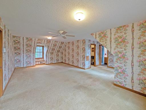 Grand primary suite with huge walk in closet.