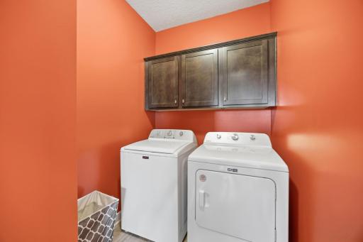 Enjoy the convenience of main level laundry with built in cabinetry for added storage and organization!