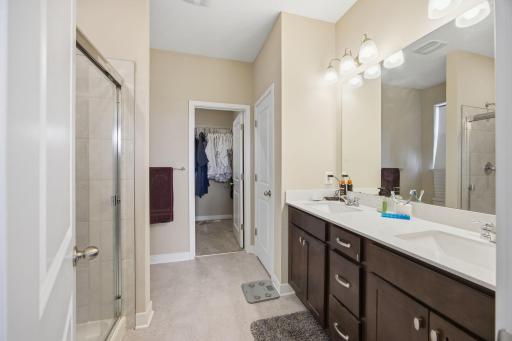 Private primary 3/4 bath with dual sink vanity and walk-in shower!