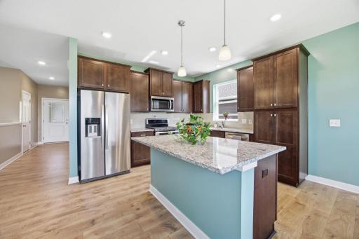 Stainless appliances, tile backsplash and abundant cabinet space!