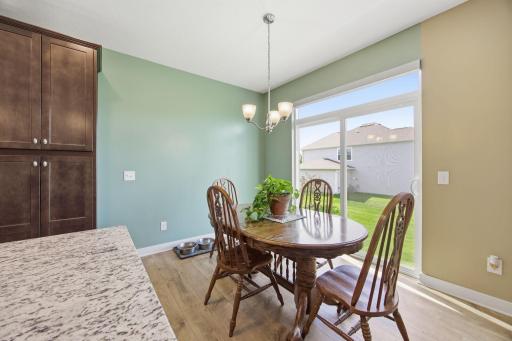 The adjoining informal dining space creates a great space for everyday living and entertaining.