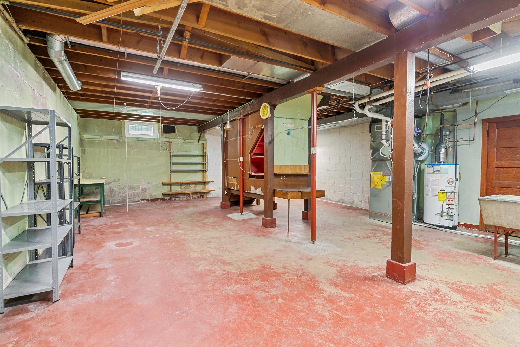 large clean basement with high ceilings ready to finish