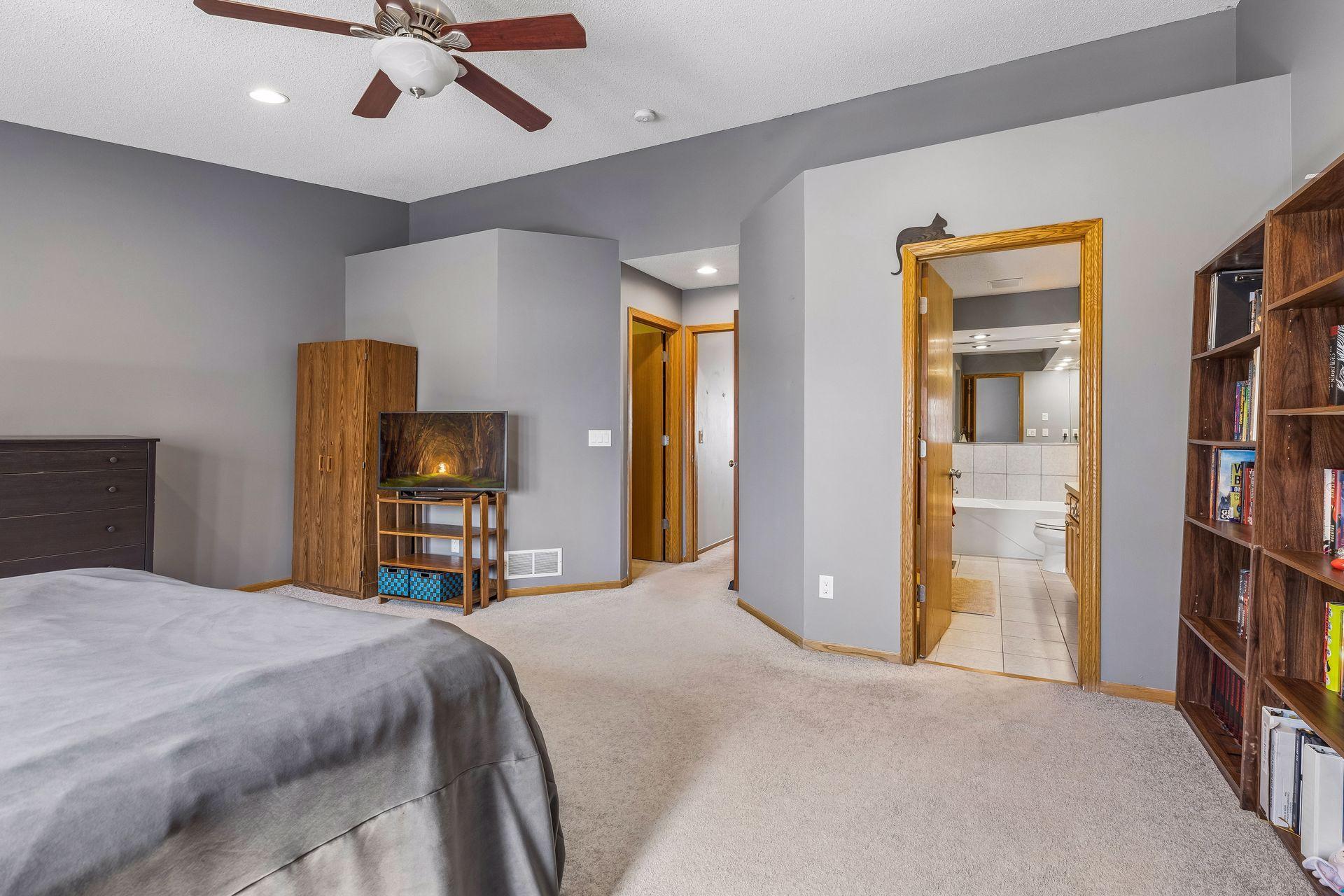 Additional view highlighting convenient access from the primary bedroom to the ensuite bathroom and walk in closet.