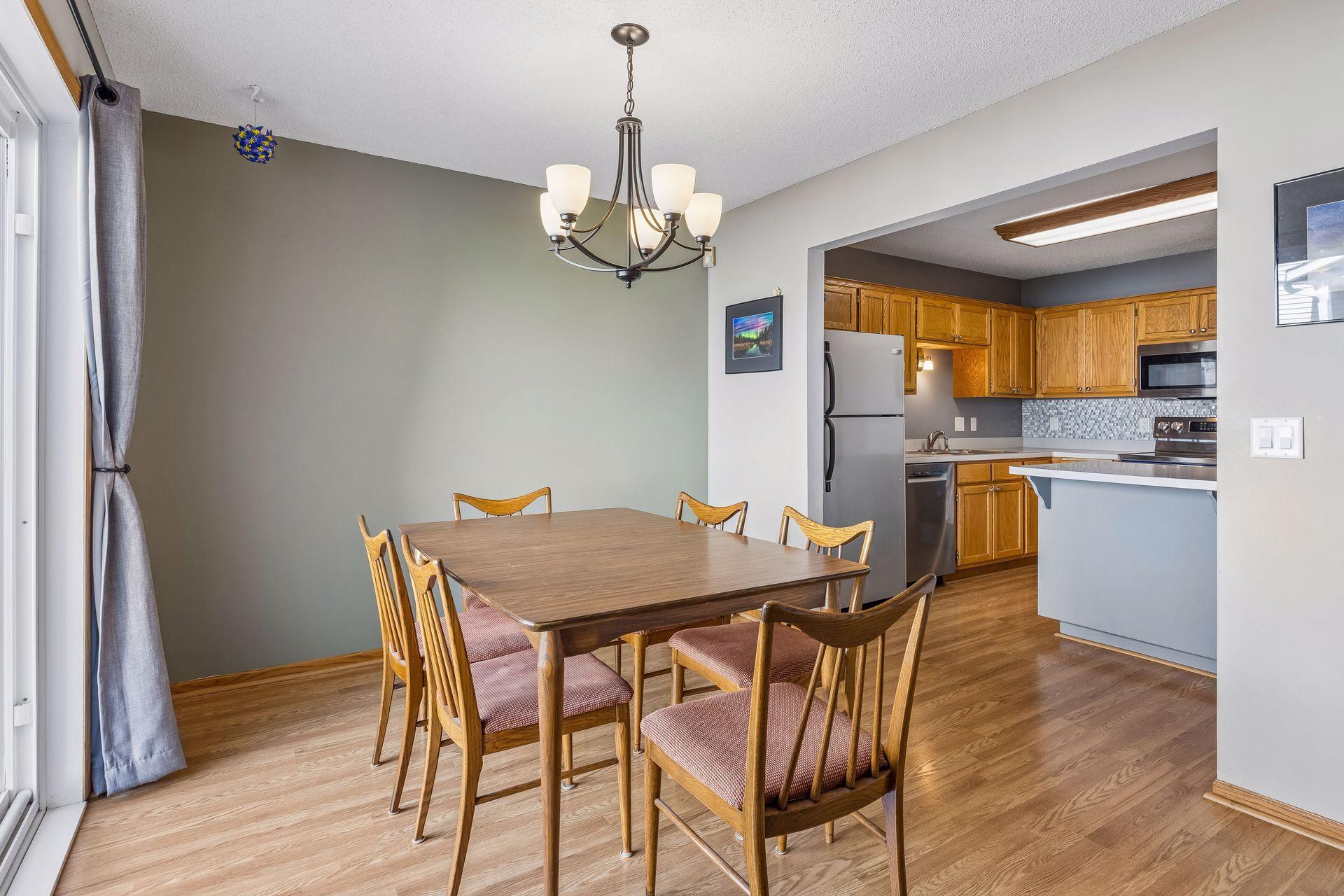 Another perspective of the dining area, emphasizing its open layout and effortless connection to the kitchen.