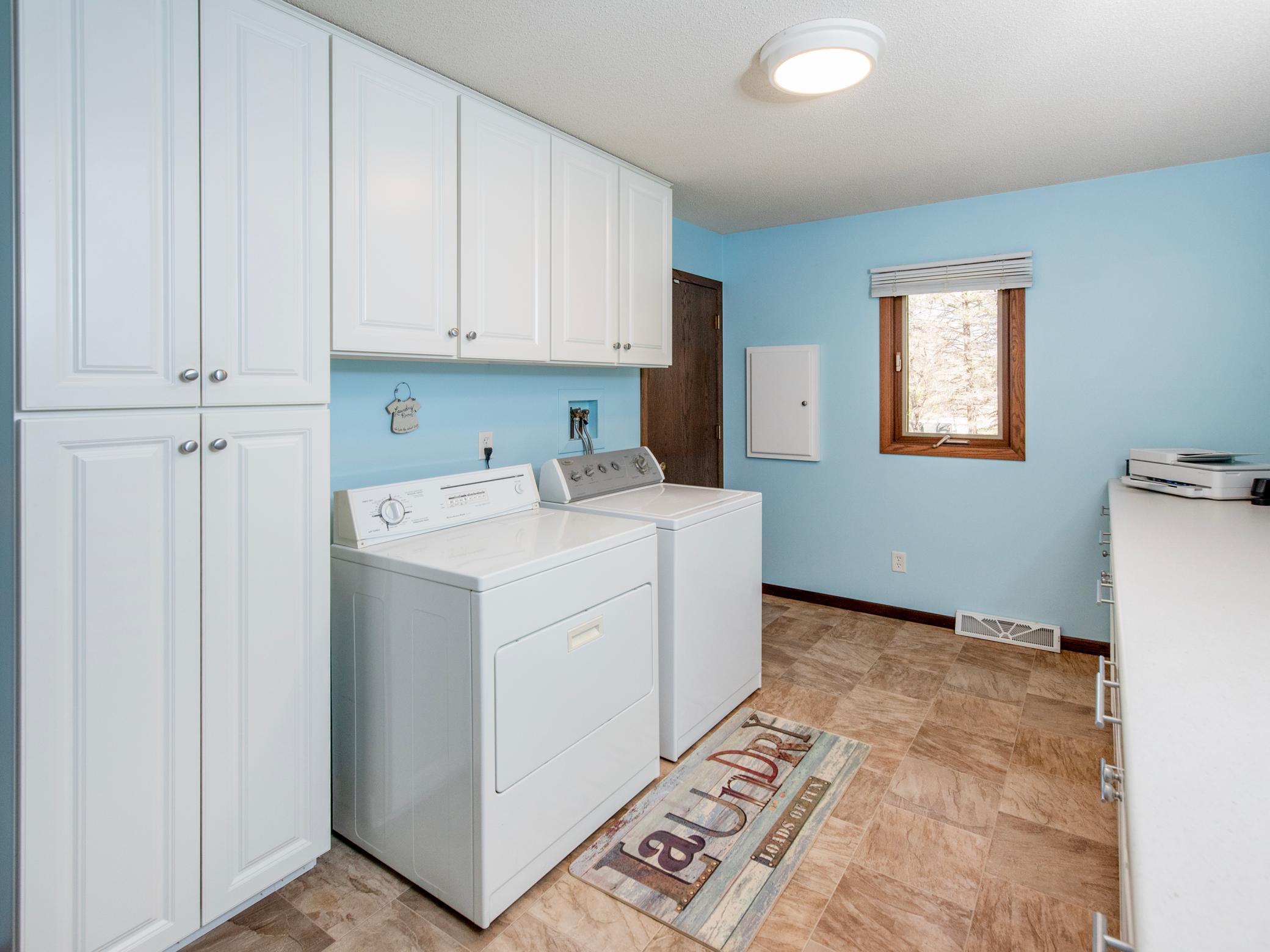 Washer/dryer, closet and cabinetry!