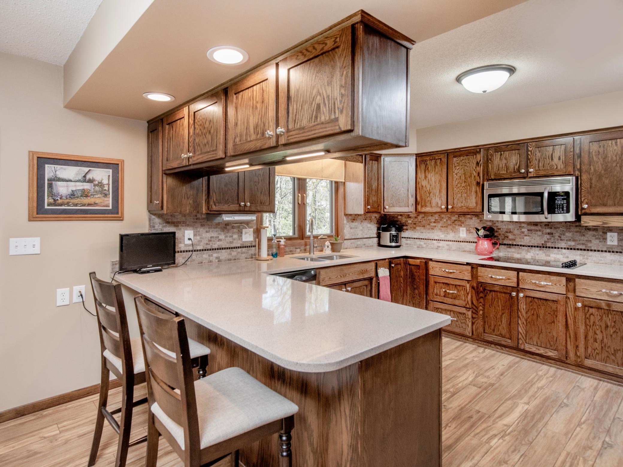 Breakfast seating. Plenty of quartz counter top space. A great place to start your day.