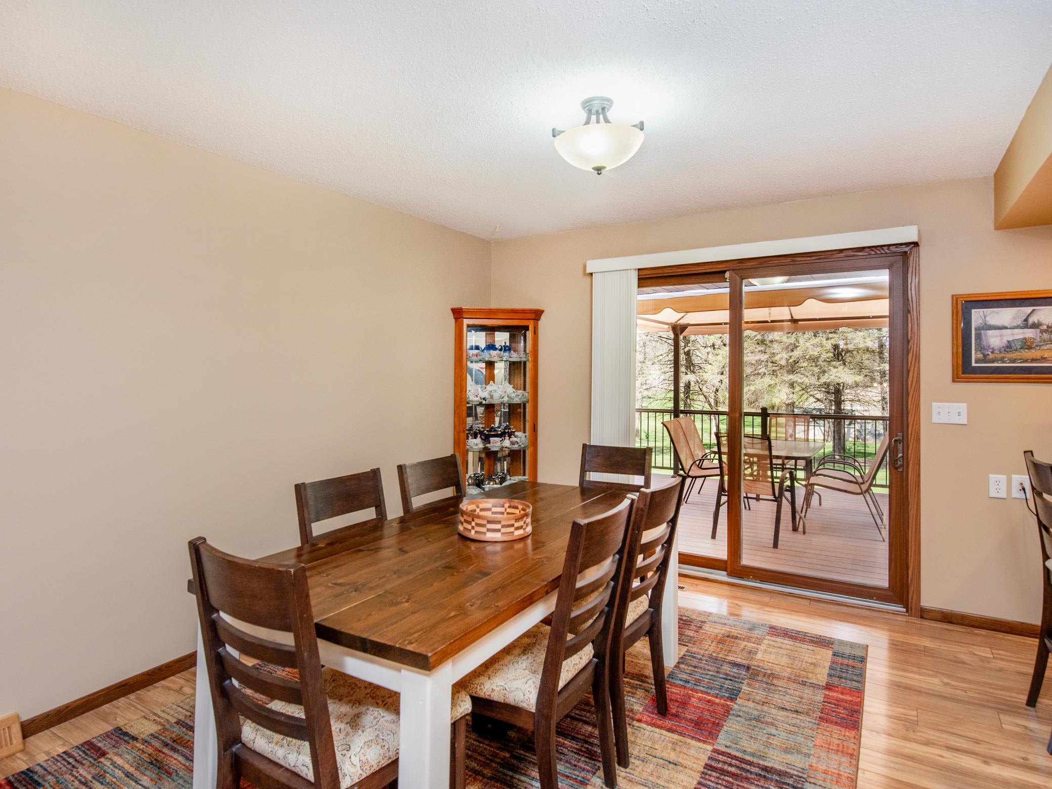Dining area leads to deck with composite material