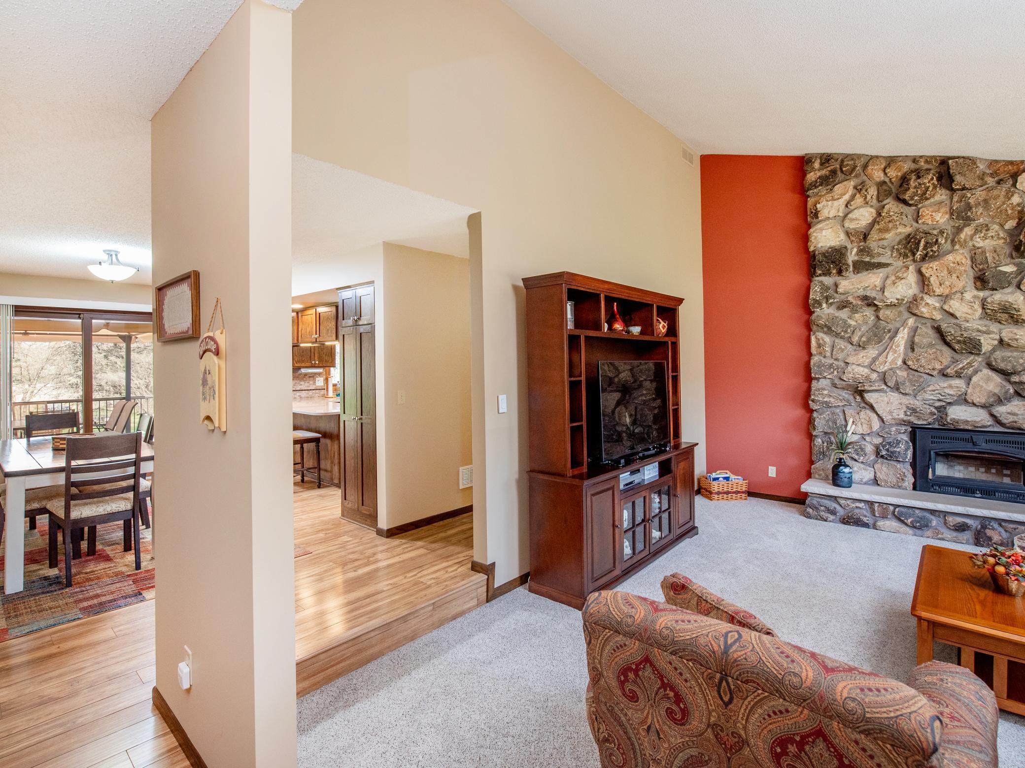 You can enter the living room from the entryway or the dining area.
