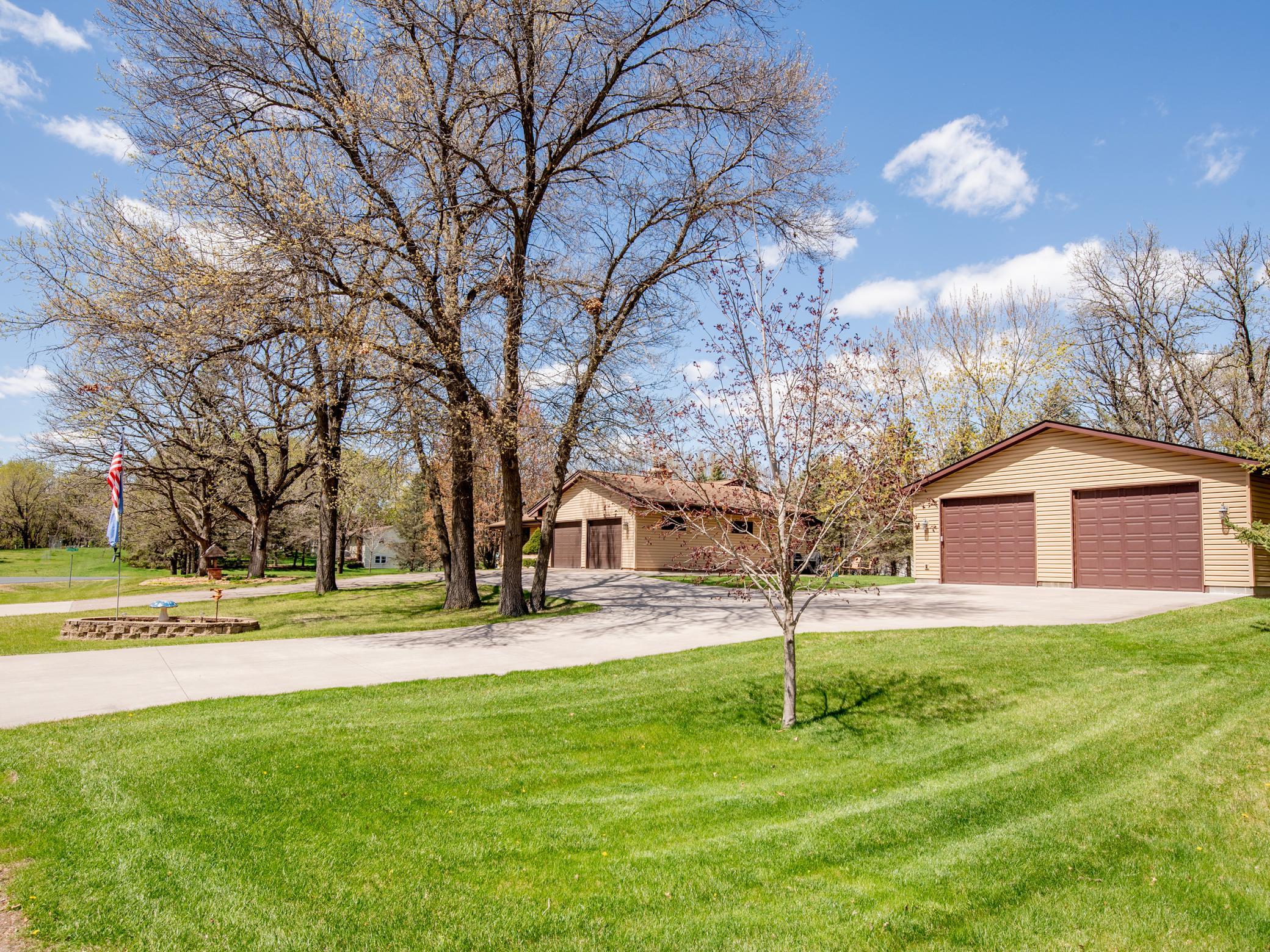 Two garages! Concrete driveway.
