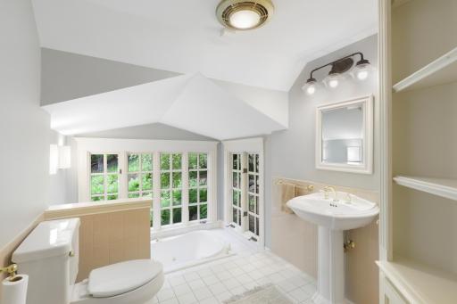 This is the 1st of 2 upper-level bathrooms which serve the 4 additional bedrooms.