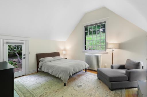 In addition to the primary ensuite, the upper level boasts a full laundry room, two additional bathrooms and four generously sized bedrooms.