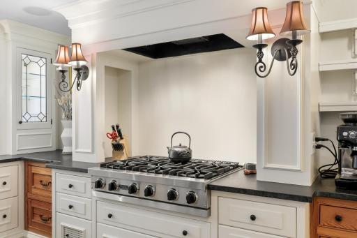 Enjoy cooking and entertaining in your well-appointed chefâs kitchen, which features stone countertops, two farmhouse sinks, Viking appliances, an additional wet bar with a wine fridge, and more.