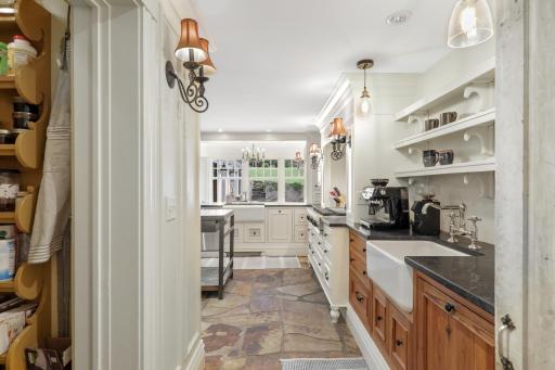 Enjoy cooking and entertaining in your well-appointed chefâs kitchen, which features stone countertops, two farmhouse sinks, Viking appliances, an additional wet bar with a wine fridge, and more.