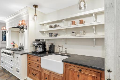 Enjoy cooking and entertaining in your well-appointed chefâs kitchen, which features stone countertops, two farmhouse sinks, Viking appliances, an additional wet bar with a wine fridge, and more.