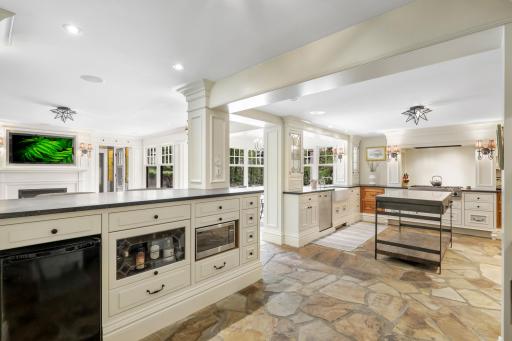 Enjoy cooking and entertaining in your well-appointed chefâs kitchen, which features stone countertops, two farmhouse sinks, Viking appliances, an additional wet bar with a wine fridge, and more.
