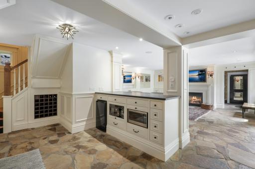 Enjoy cooking and entertaining in your well-appointed chefâs kitchen, which features stone countertops, two farmhouse sinks, Viking appliances, an additional wet bar with a wine fridge, and more.