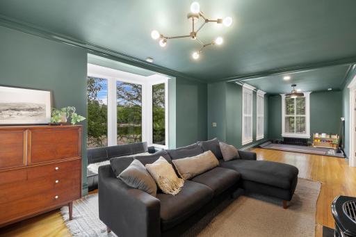 The sprawling main floor also features a dedicated office space, a separate formal dining room, and a peaceful family room with flex space.