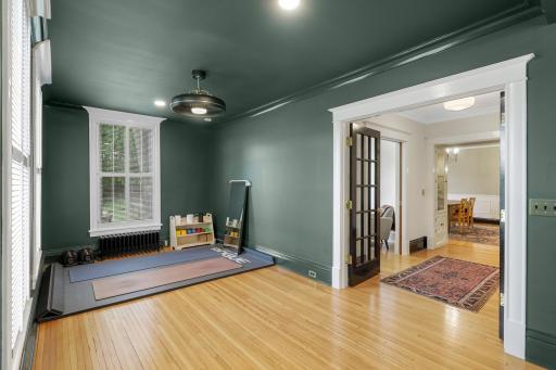 The sprawling main floor also features a dedicated office space, a separate formal dining room, and a peaceful family room with flex space.