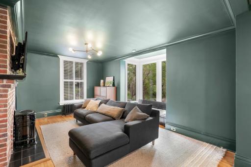 The sprawling main floor also features a dedicated office space, a separate formal dining room, and a peaceful family room with flex space.