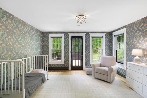 In addition to the primary ensuite, the upper level boasts a full laundry room, two additional bathrooms and four generously sized bedrooms.