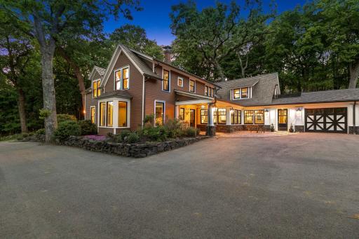 The new asphalt driveway provides plenty of space for children to play and for guests to park.