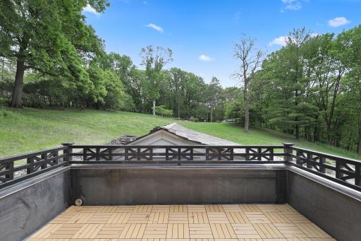 One of the bedrooms walks out at grade, and two of the bedrooms walk out to private decks.