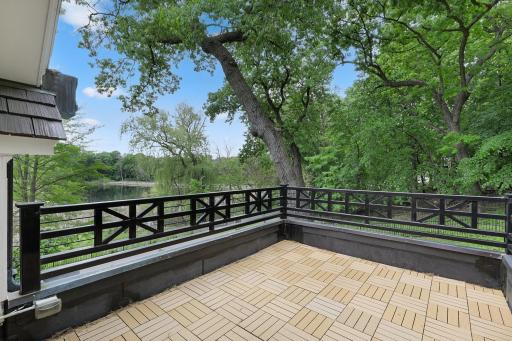 One of the bedrooms walks out at grade, and two of the bedrooms walk out to private decks.