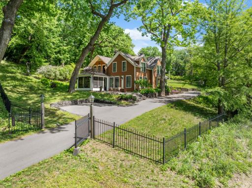 The fully fenced, maturely wooded, resort like estate provides nearly 360 degrees of privacy and ample space for endless outdoor activities.