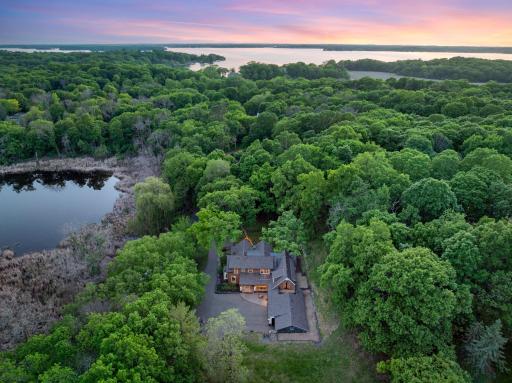 The fully fenced, maturely wooded, resort like estate provides nearly 360 degrees of privacy and ample space for endless outdoor activities.