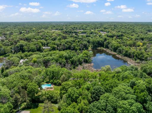 From the moment you turn on to Shavers Lane you feel like you're up north but you are only 20 minutes from downtown Minneapolis, a 7-minute drive to the village of Wayzata, a 10-minute drive to the village of Excelsior.