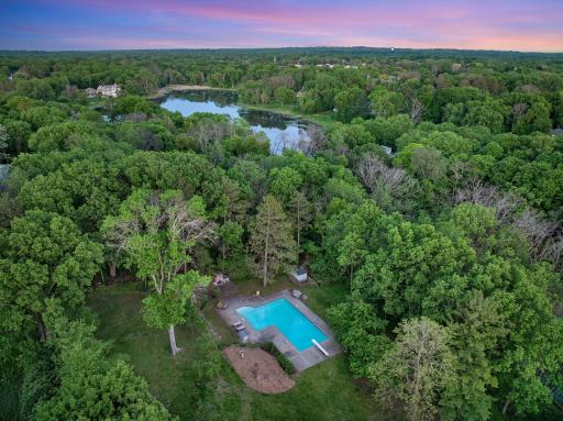 The fully fenced, maturely wooded, resort like estate provides nearly 360 degrees of privacy and ample space for endless outdoor activities.