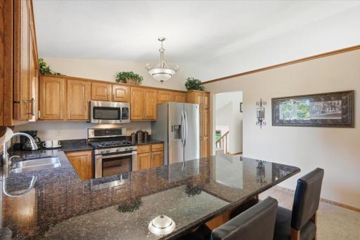 Plenty of workspace on these beautiful granite countertops.