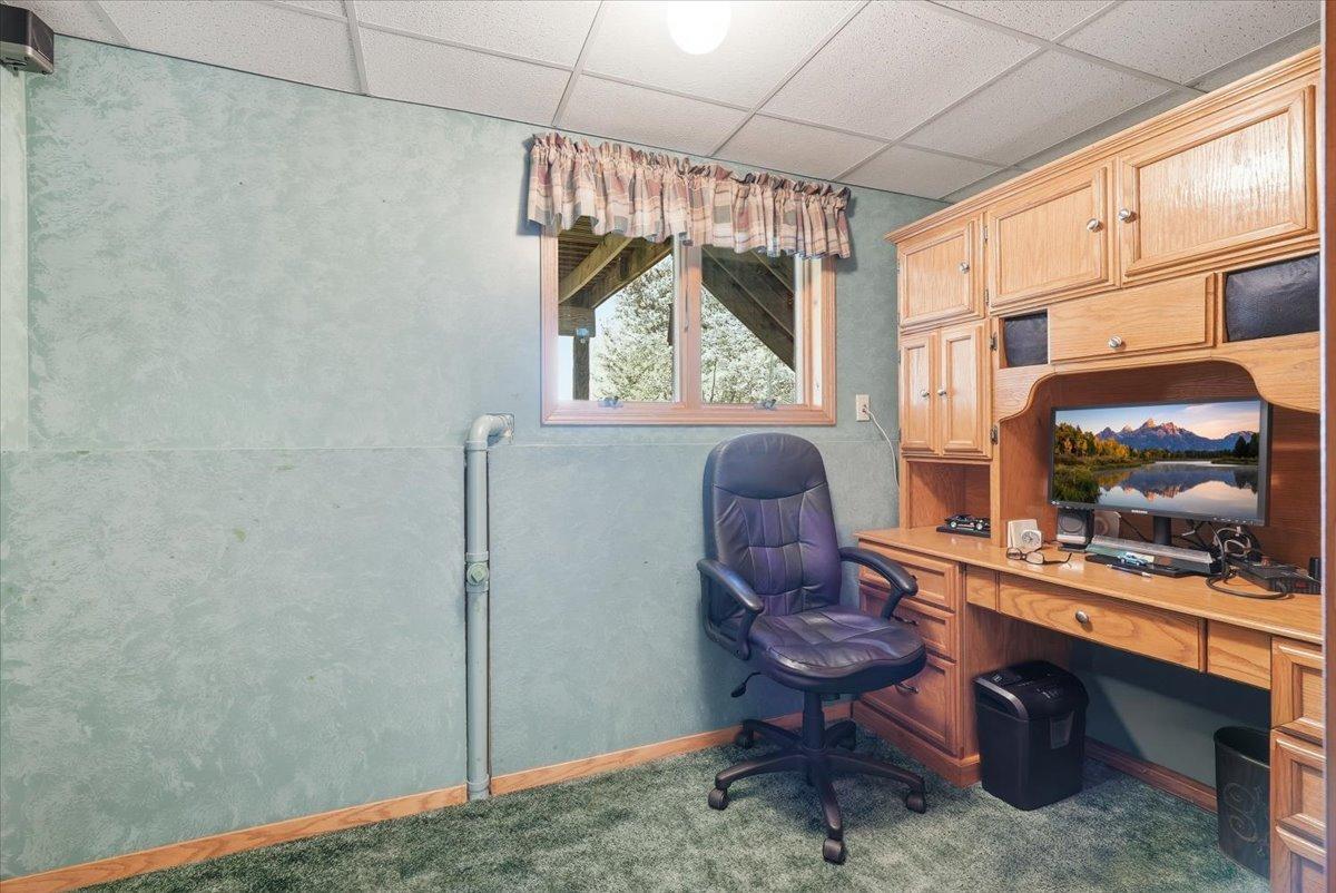 Office workspace in the lower level for remote work or use as a craft room.