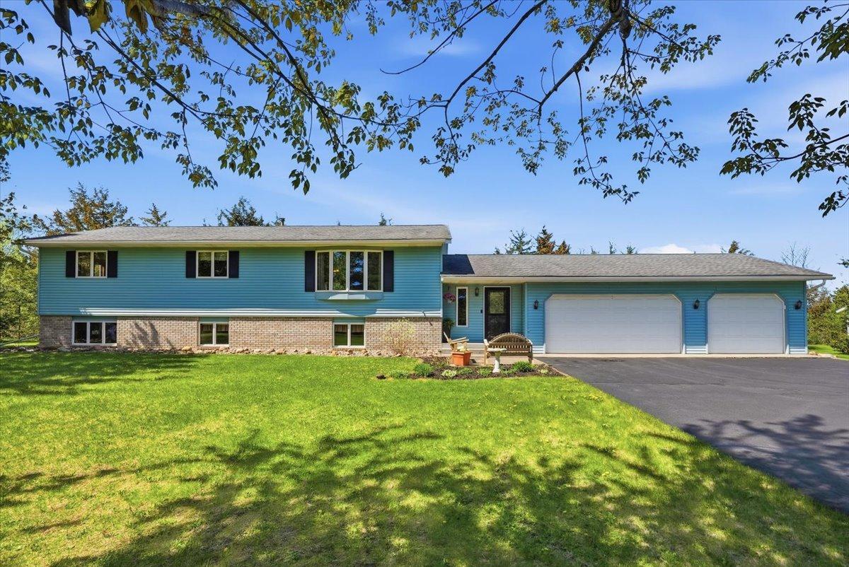 Welcome to 1087 Tanney Lane! Your perfect blend of privacy, space & storage.